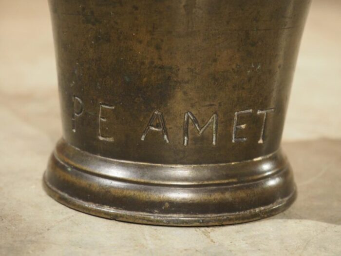 18th century bell shaped french bronze mortar with pestle inscribed pe amet 1056