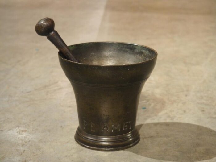 18th century bell shaped french bronze mortar with pestle inscribed pe amet 2007