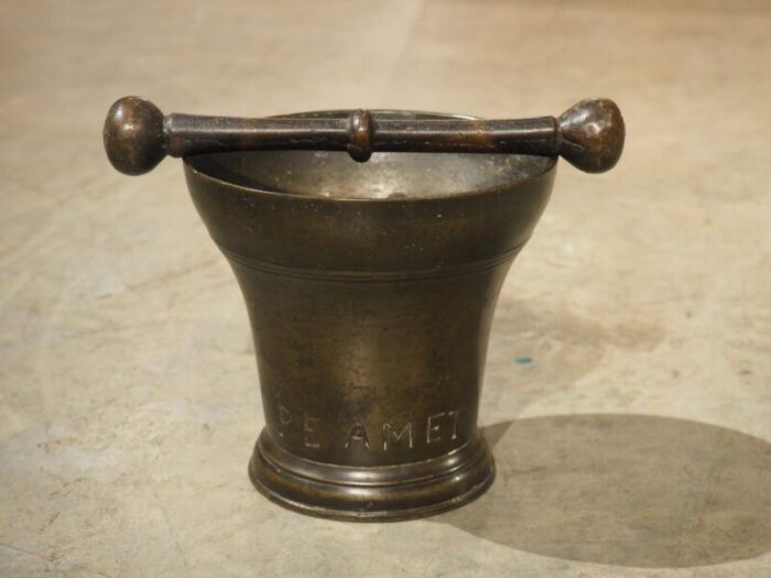 18th century bell shaped french bronze mortar with pestle inscribed pe amet 3686