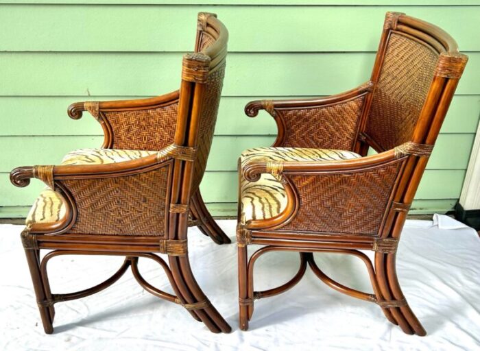 1990s vintage rattan and wicker upholstered arm chairs a pair 1990