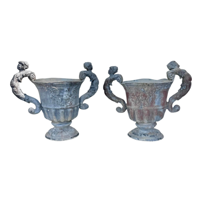 a pair of neoclassical lead urns planters 3963