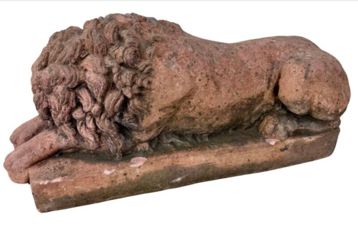 a pair of terracotta recumbent lion statues 3879