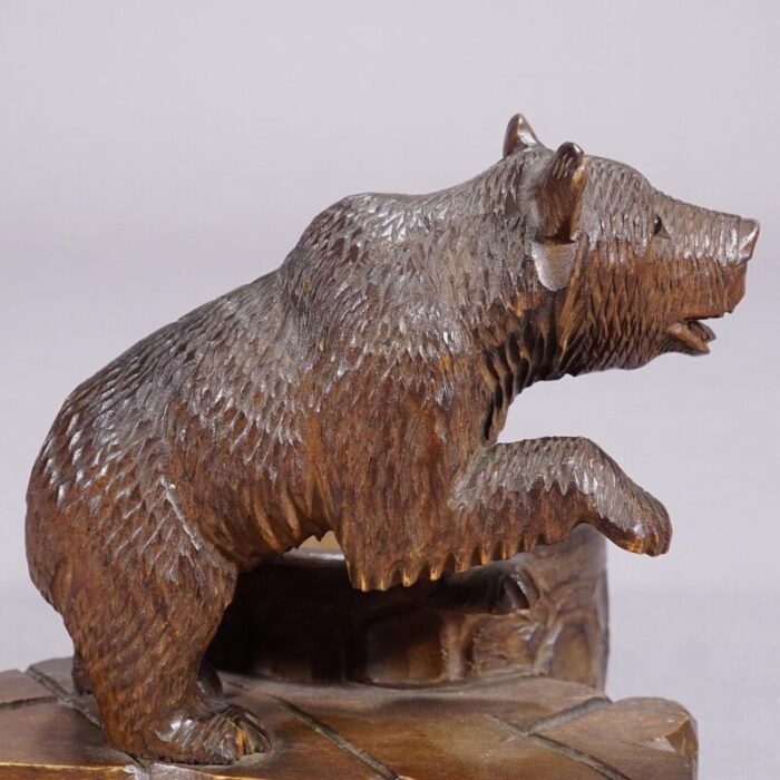 a wooden carved black forest bear with bowl ca 1920s 3022