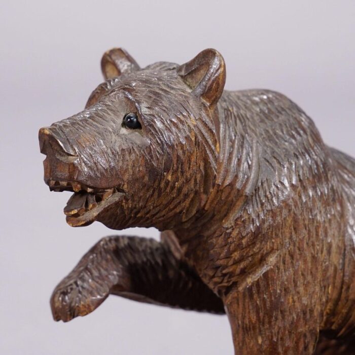 a wooden carved black forest bear with bowl ca 1920s 3643