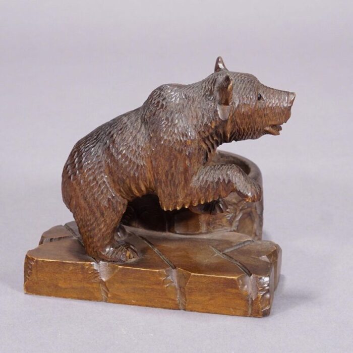 a wooden carved black forest bear with bowl ca 1920s 5601