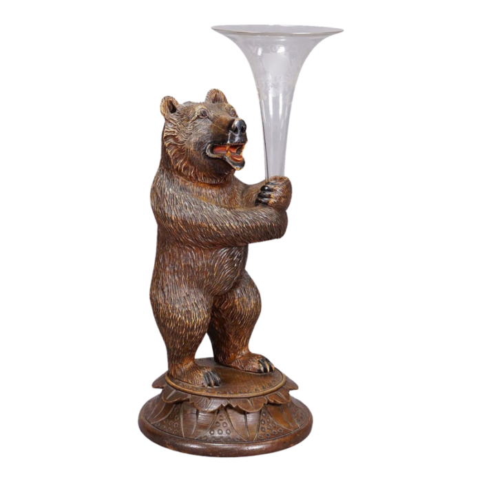 a wooden carved black forest bear with glass vase 2728