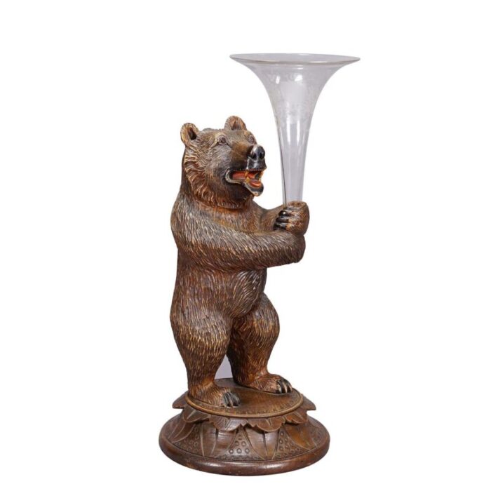 a wooden carved black forest bear with glass vase 5719