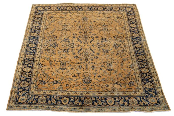 antique persian kerman wool rug handmade in tan featuring an allover motif 0960