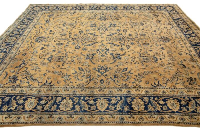 antique persian kerman wool rug handmade in tan featuring an allover motif 3150