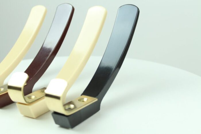 bakelite and brass coat hooks from km austria 1950s set of 4 2