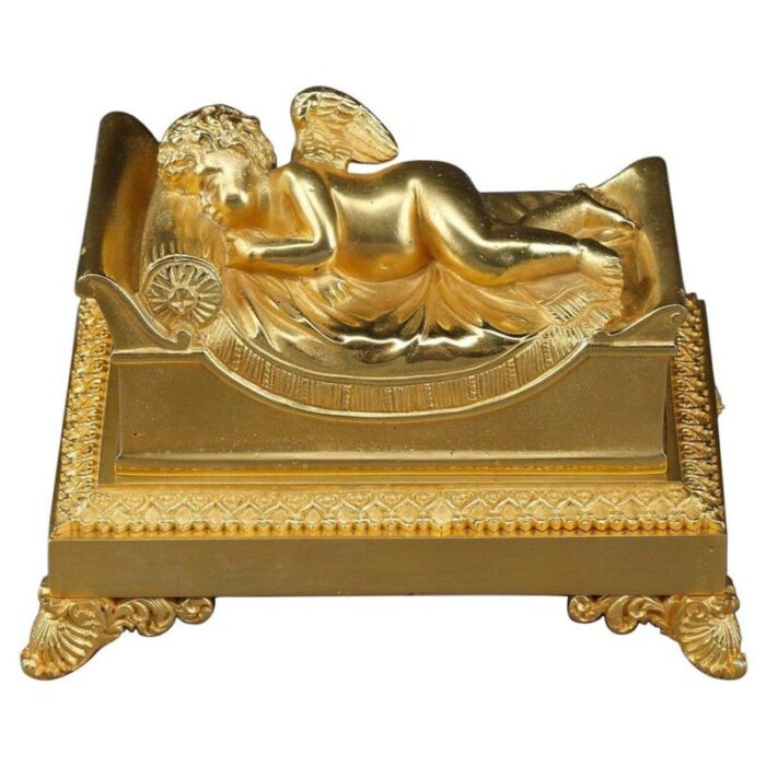 bronze inkwell depicting a sleeping putto 1