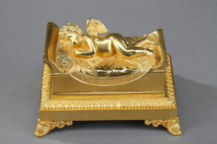 bronze inkwell depicting a sleeping putto 3