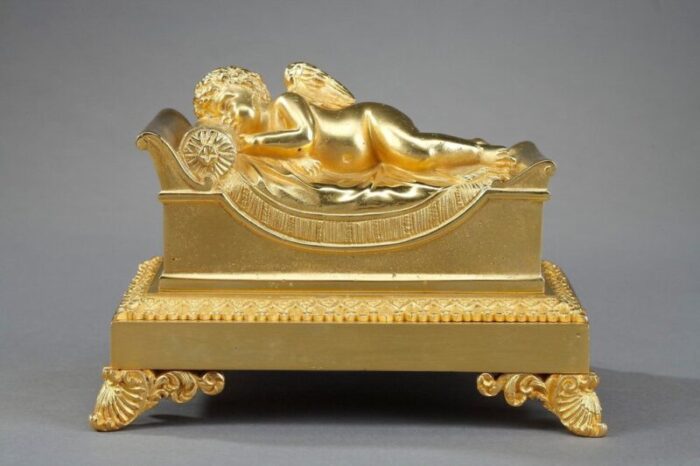 bronze inkwell depicting a sleeping putto 4