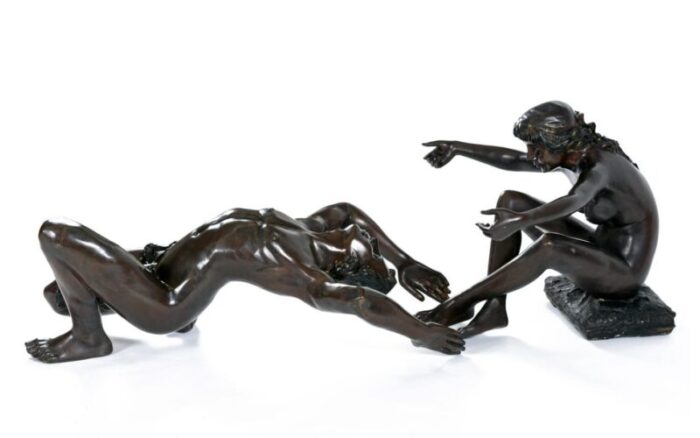 bronze male and female figural sculptural coffee table by c conndray with glass top 4232