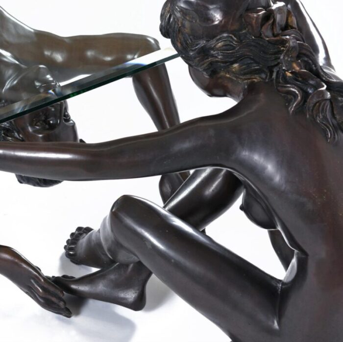 bronze male and female figural sculptural coffee table by c conndray with glass top 7160