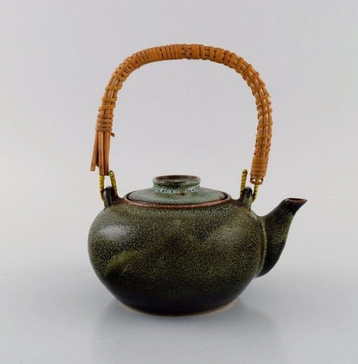 chinese teapot in glazed stoneware with wicker handle 20th century 4