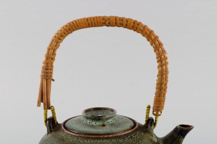 chinese teapot in glazed stoneware with wicker handle 20th century 5