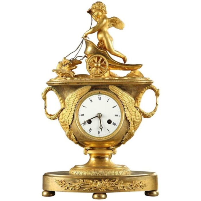 early 19th century empire mantel clock with cupid in a chariot 1