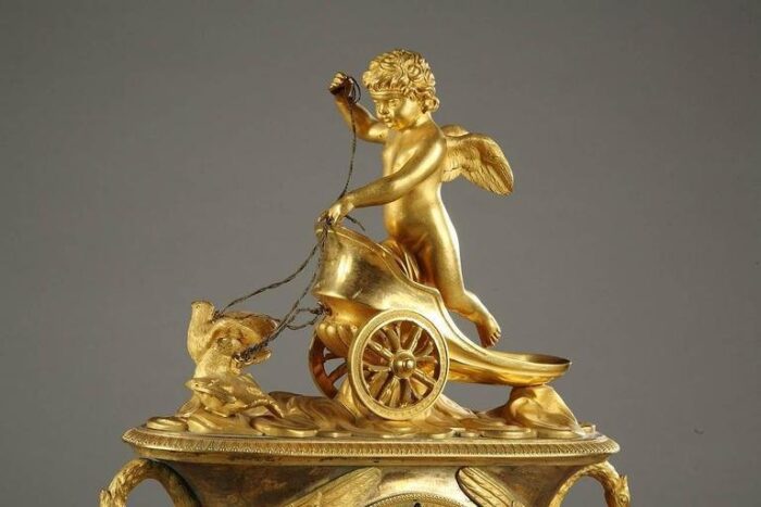 early 19th century empire mantel clock with cupid in a chariot 2