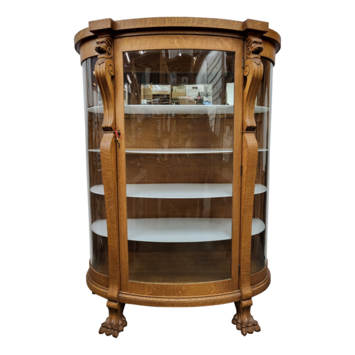 early 20th century antique curved glass lion head display cabinet with key 2081