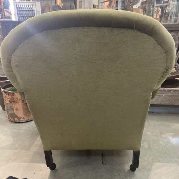 early 20th century pair of olive green upholstered velvet armchairs on rollers 9337