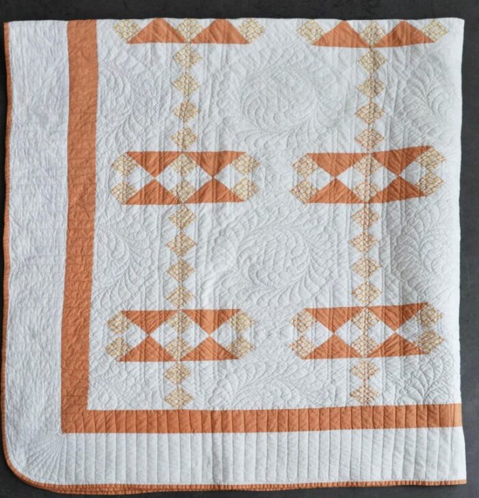 early 20th century quilt with hand stitched mattlasse detail 0471