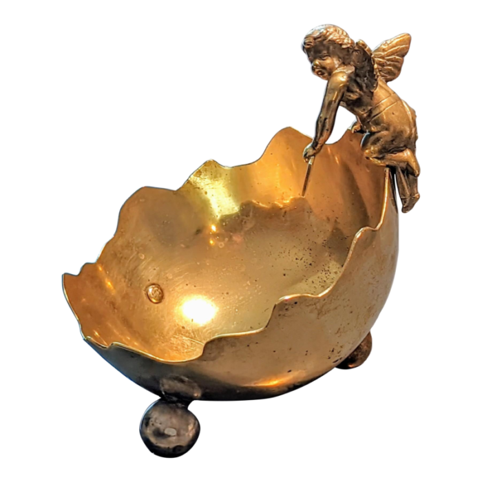 early 20th century tilted brass catch all with cherub on top 7437