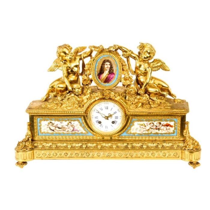 french gilt bronze clock with portrait plaque of moliere 19th century 1