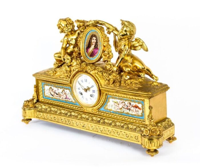 french gilt bronze clock with portrait plaque of moliere 19th century 2