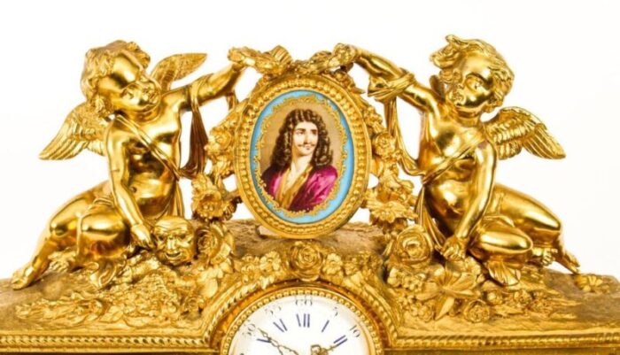 french gilt bronze clock with portrait plaque of moliere 19th century 3