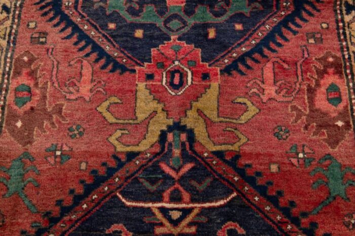 handmade red vintage heriz wool runner with tribal design 0175