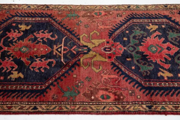 handmade red vintage heriz wool runner with tribal design 1448