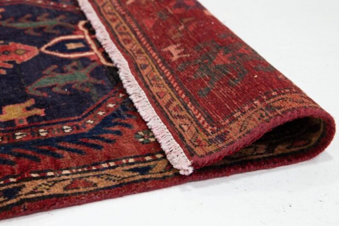 handmade red vintage heriz wool runner with tribal design 7100