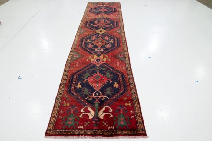 handmade red vintage heriz wool runner with tribal design 7181