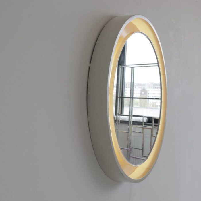 large round illuminated wooden mirror 1970s 2