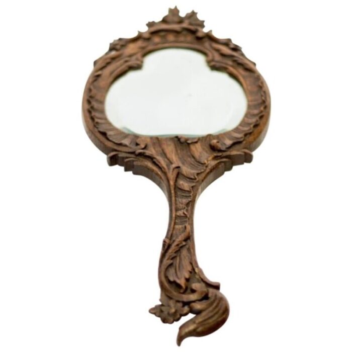 louis xv style carved oakwood hand mirror 1