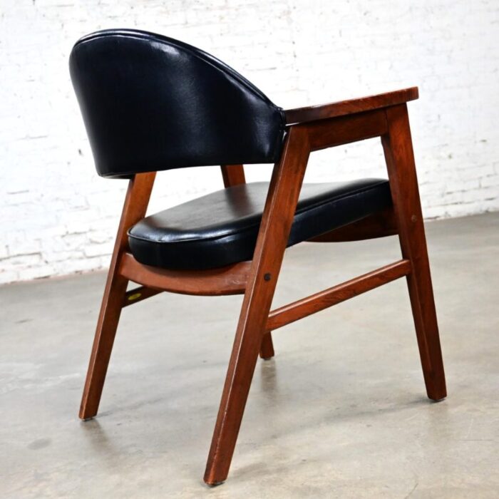 mid 20th century mid century modern madison furniture single oak armchair with oak frame and black vinyl 1973