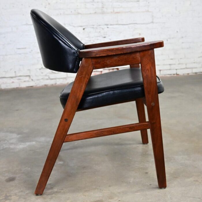 mid 20th century mid century modern madison furniture single oak armchair with oak frame and black vinyl 2280