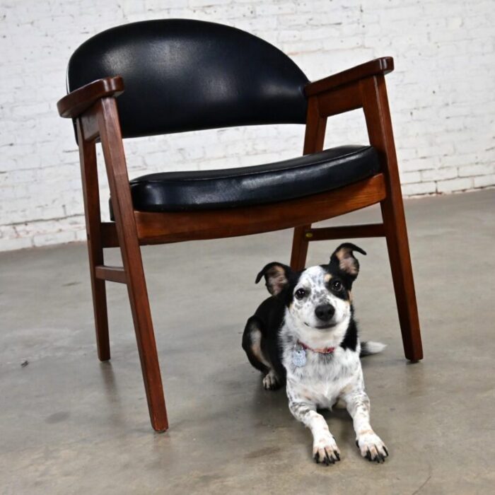 mid 20th century mid century modern madison furniture single oak armchair with oak frame and black vinyl 4131