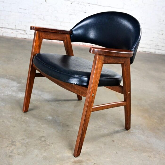 mid 20th century mid century modern madison furniture single oak armchair with oak frame and black vinyl 4878