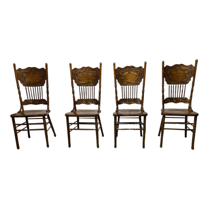 mid 20th century set of four vintage solid pressed back tiger oak carved dining chairs 2093