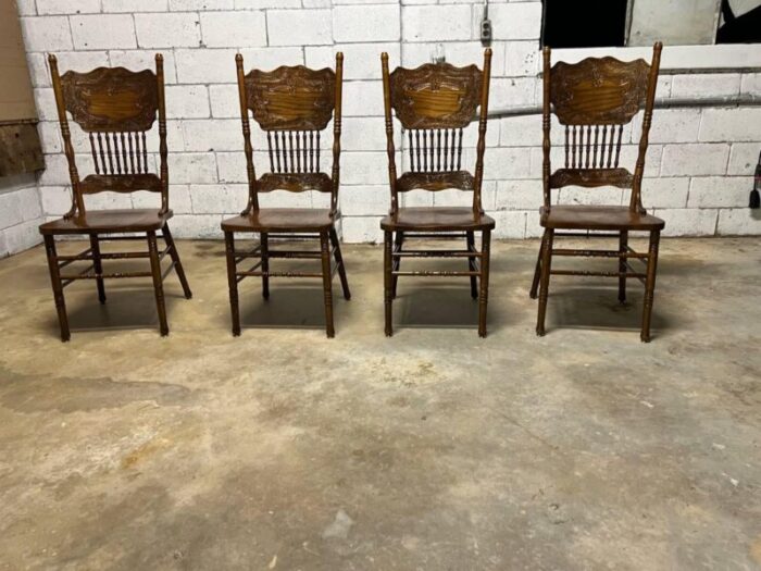 mid 20th century set of four vintage solid pressed back tiger oak carved dining chairs 2509