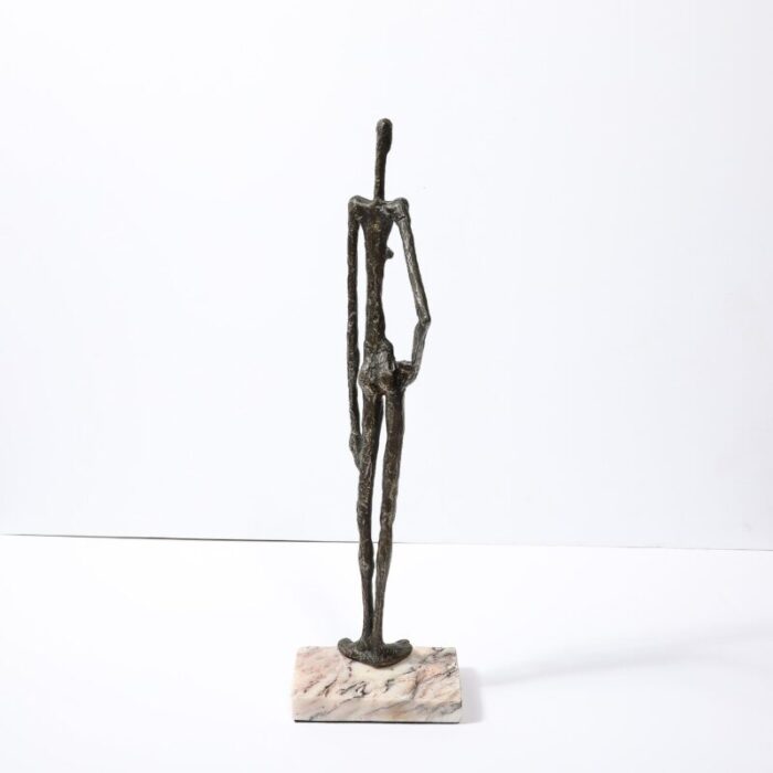 mid century modernist figurative bronze sculpture in contrapostto on marble base 2022