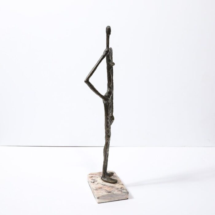 mid century modernist figurative bronze sculpture in contrapostto on marble base 9006