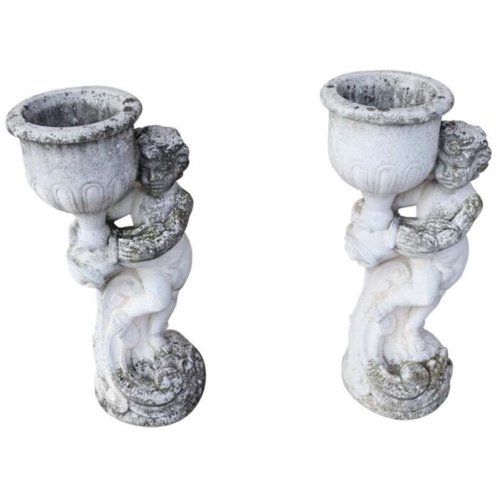 neoclassical stone garden statues with vases 1930s set of 2 1