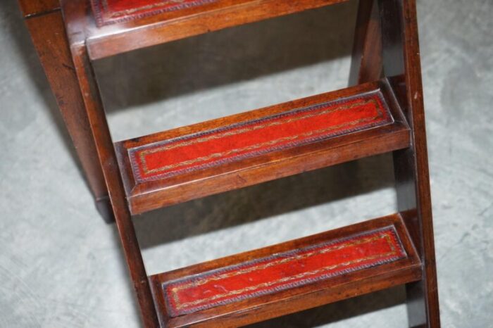 regency metamorphic library steps or table with oxblood leather 15