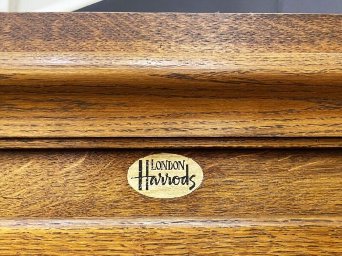 single haberdashers cabinet with glass fronted drawers from harrods london 1020