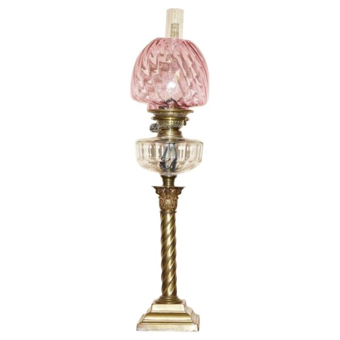 victorian oil lamp in ruby glass with spiral corinthian pillar base 1