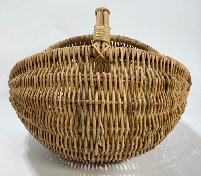 vintage extra large primitive handwoven buttocks style gathering basket 9028