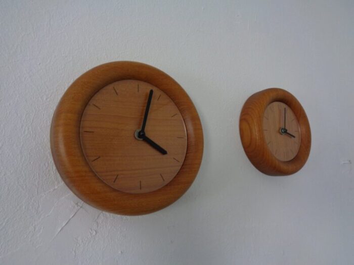 wall clocks in solid teak from boeckenhauer set of 2 1970s 1